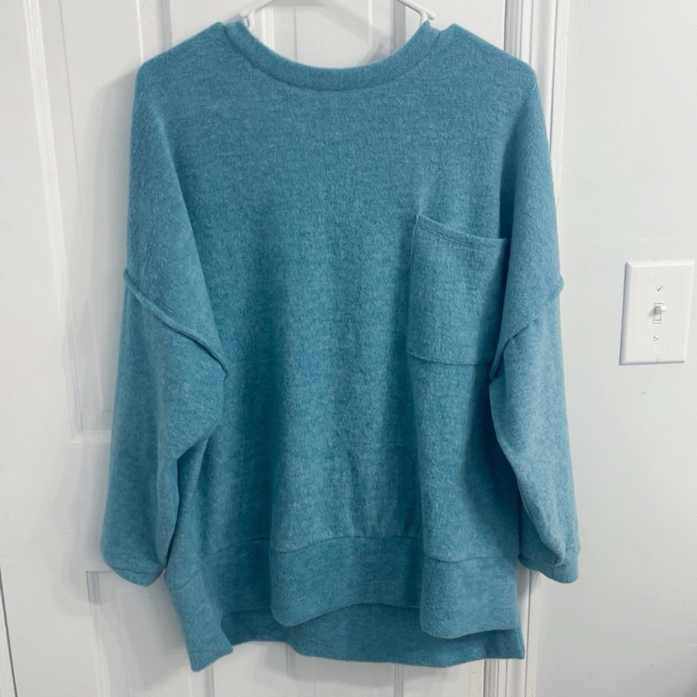blue sweater